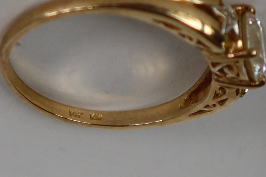 A 14ct gold dress ring set with a round faceted cubic zirconium, size U 1/2, approximately 3. - Image 6 of 7