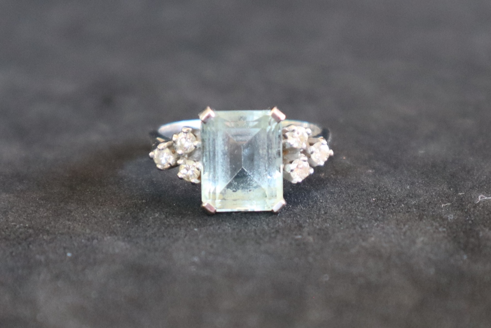 An aquamarine and diamond dress ring, set with an emerald cut aquamarine approximately 3. - Image 2 of 7