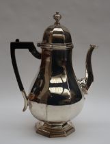 An Edward VII silver baluster coffee pot, London, 1904, Thomas Bradbury and Sons,