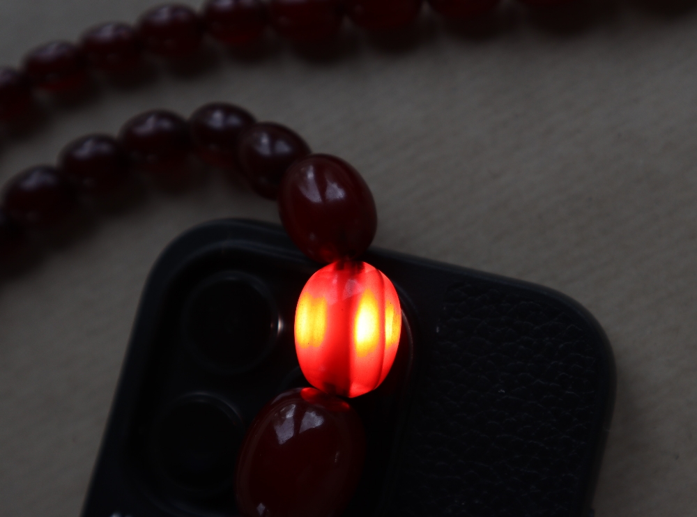 Two Cherry Amber / bakelite bead necklaces, ranging in size from 30mm to 10mm, 79cm long, - Bild 8 aus 12