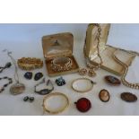 Assorted costume jewellery including a Trifari suite of necklace,