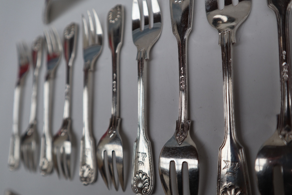 A set of ten George V silver fiddle shell and line decorated dessert forks, London, 1911, - Image 2 of 7