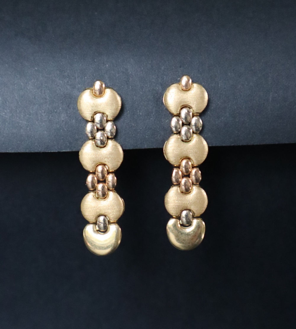 A pair of 18ct two tone gold drop earrings,