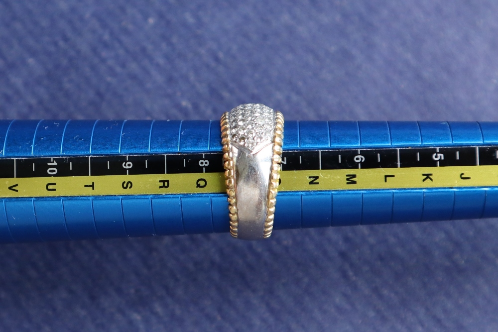 An 18ct yellow and white gold ring, set with a panel of round brilliant cut diamonds, size P, - Image 8 of 8