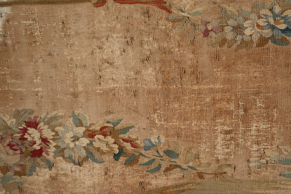 An 18th century French Aubusson medallion pastoral tapestry with a floral swag border, - Image 5 of 8