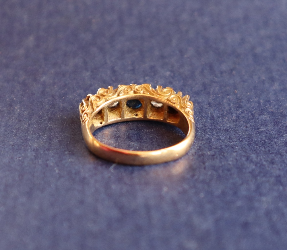 An 18ct gold sapphire and diamond dress ring, - Image 4 of 6