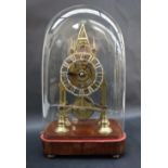 A brass single fusee skeleton clock, of architectural design,