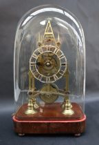 A brass single fusee skeleton clock, of architectural design,