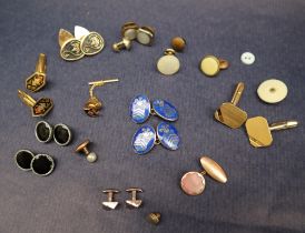 A pair of silver and blue enamel cufflinks decorated with the Prince of Wales feathers and a shield