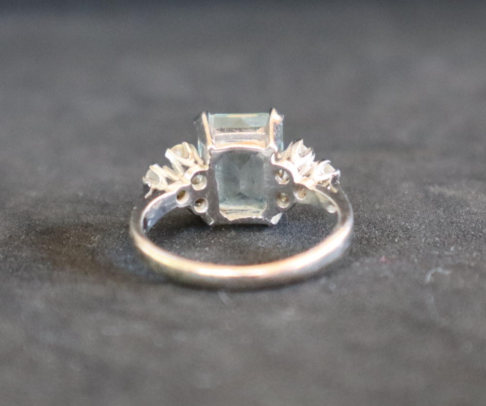 An aquamarine and diamond dress ring, set with an emerald cut aquamarine approximately 3. - Image 5 of 7