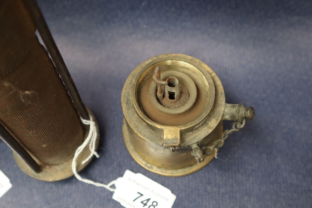 A 19th century brass Davy lamp, with an arched top and gauze shield on a screwed on brass base, 24. - Image 9 of 12