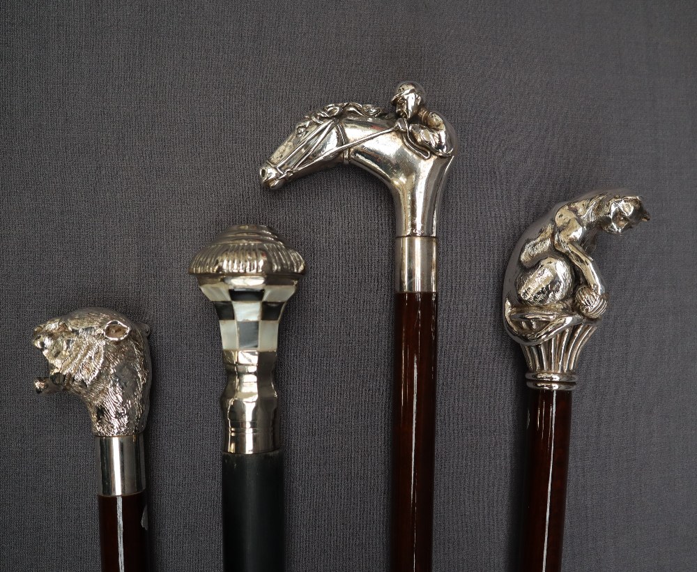 A continental silver topped walking stick, the handle in the form of a race horse head and jockey, - Image 2 of 17