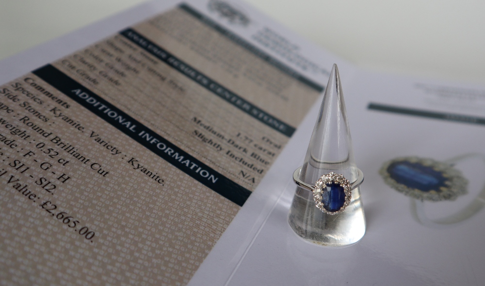 An 18ct white gold kyanite and diamond cluster ring set with an oval faceted Kyanite approximately - Image 2 of 9