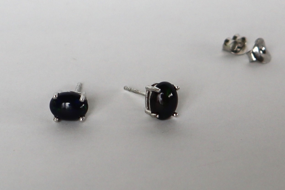 A pair of Ethiopian black opal stud earrings to a silver setting and post - Image 2 of 3