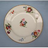 A Swansea porcelain dessert plate decorated with sprays of garden flowers to a gilt border,