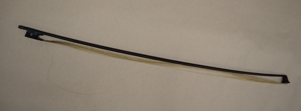 An E. Henry A Paris silver mounted violin bow, faint stamp by the frog, 74.