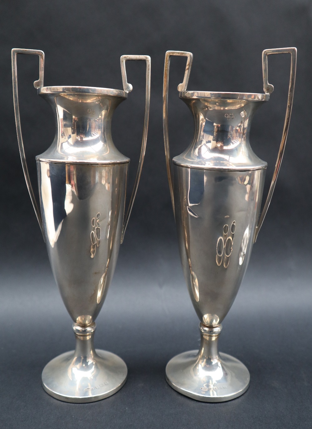 A pair of George V silver twin handled bud vases, Birmingham, 1915, Joseph Gloster Ltd, - Image 3 of 5