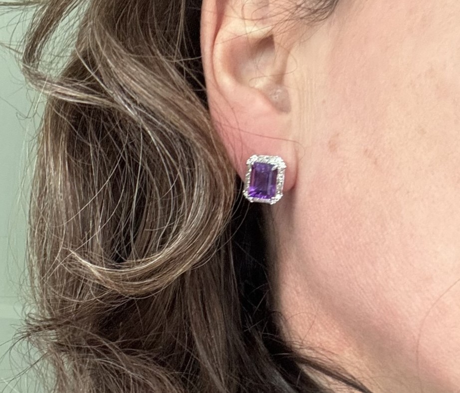 A pair of amethyst and diamond earrings each set with a step cut amethyst surrounded by twenty two - Image 6 of 6