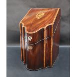 A George III mahogany serpentine fronted knife box with a shell inlaid crossbanded top,