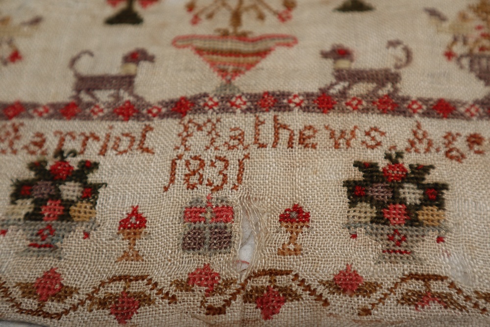 A William IV needlework sampler with the alphabet to the top, trees, dogs and other animals, - Image 2 of 4