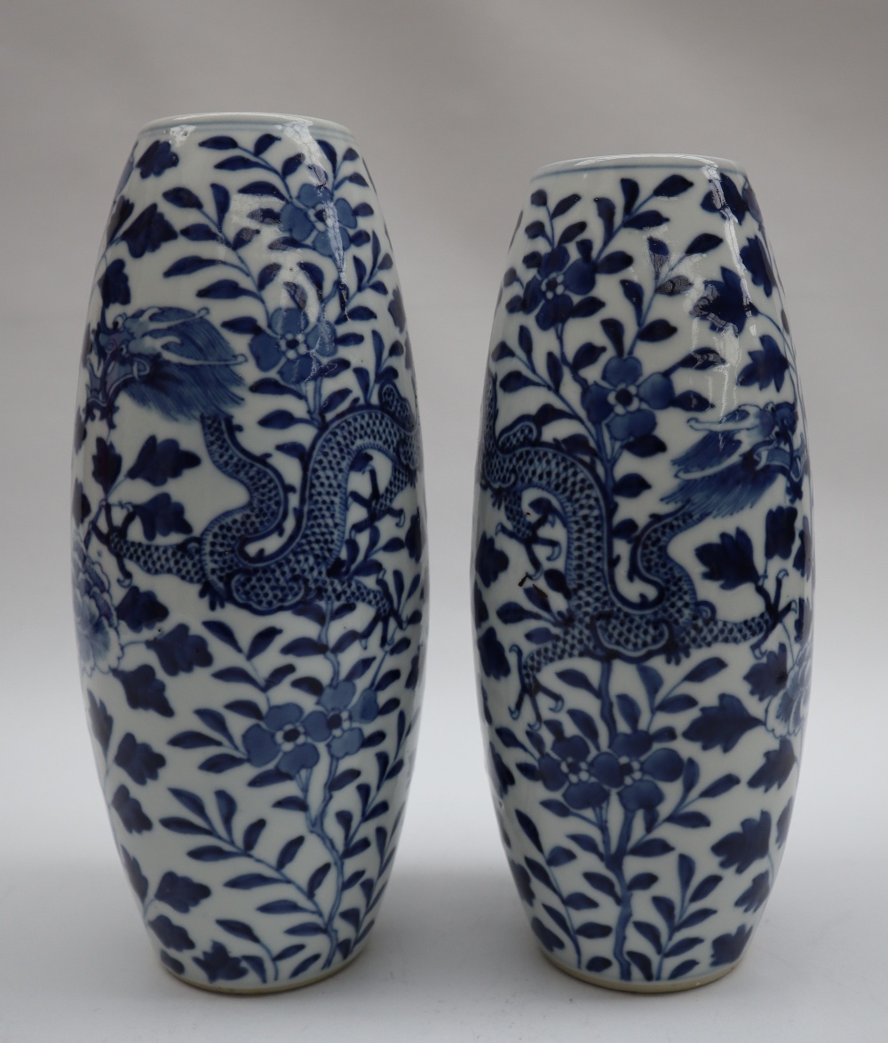 A pair of Chinese porcelain vases of tapering shape decorated with four toed dragons, - Image 3 of 7
