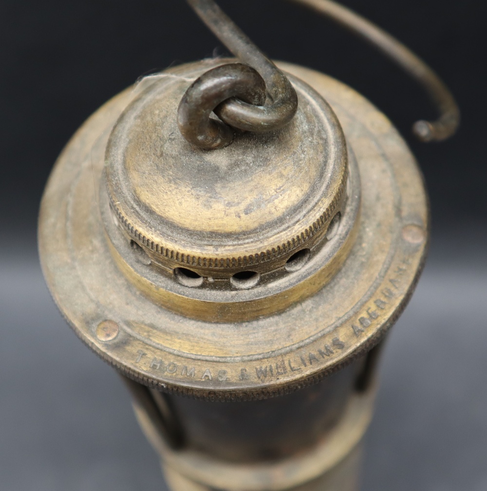 A Thomas and Williams of Aberdare Fireman's safety lamp with a domed top and pierced metal cylinder, - Bild 5 aus 6