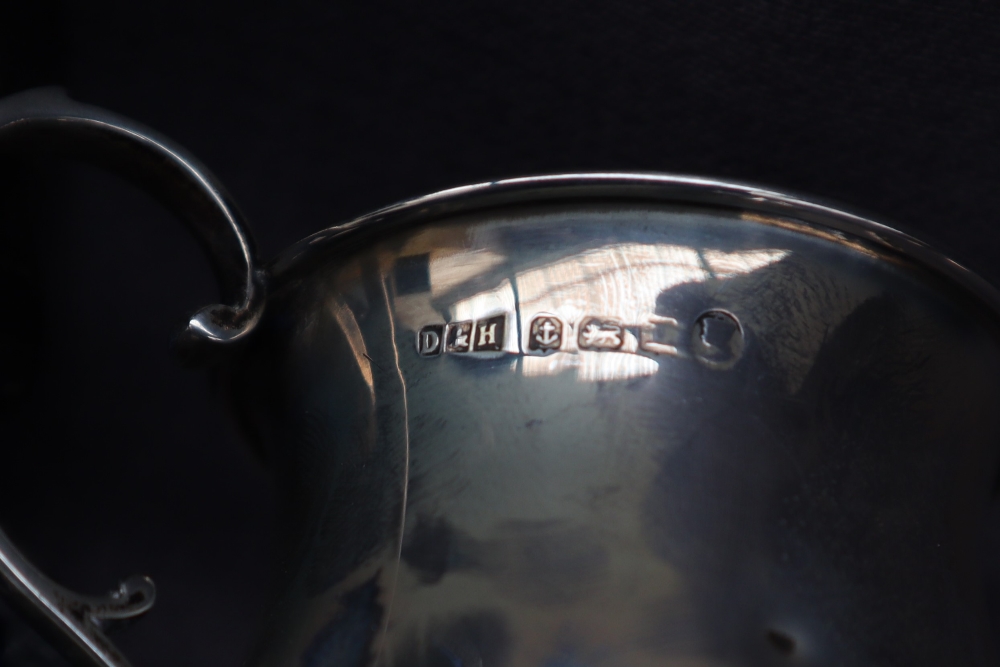 A George V silver christening mug of baluster form with a spreading foot, Birmingham, 1935, - Image 5 of 5