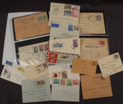 A folder of stamped envelopes all stencilled Tin Can Mail and other envelopes