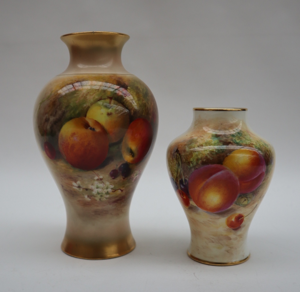 A Royal Worcester vase with a flared rim and inverted baluster body painted with apples and