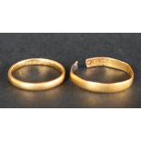 A 22ct yellow gold wedding band, size J together with another 22ct yellow gold ring, cut,