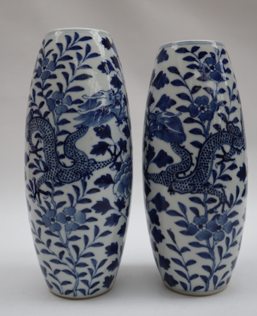 A pair of Chinese porcelain vases of tapering shape decorated with four toed dragons, - Image 5 of 7