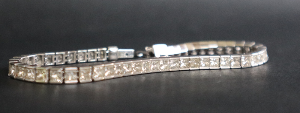 An 18ct white gold diamond set tennis bracelet, - Image 9 of 10