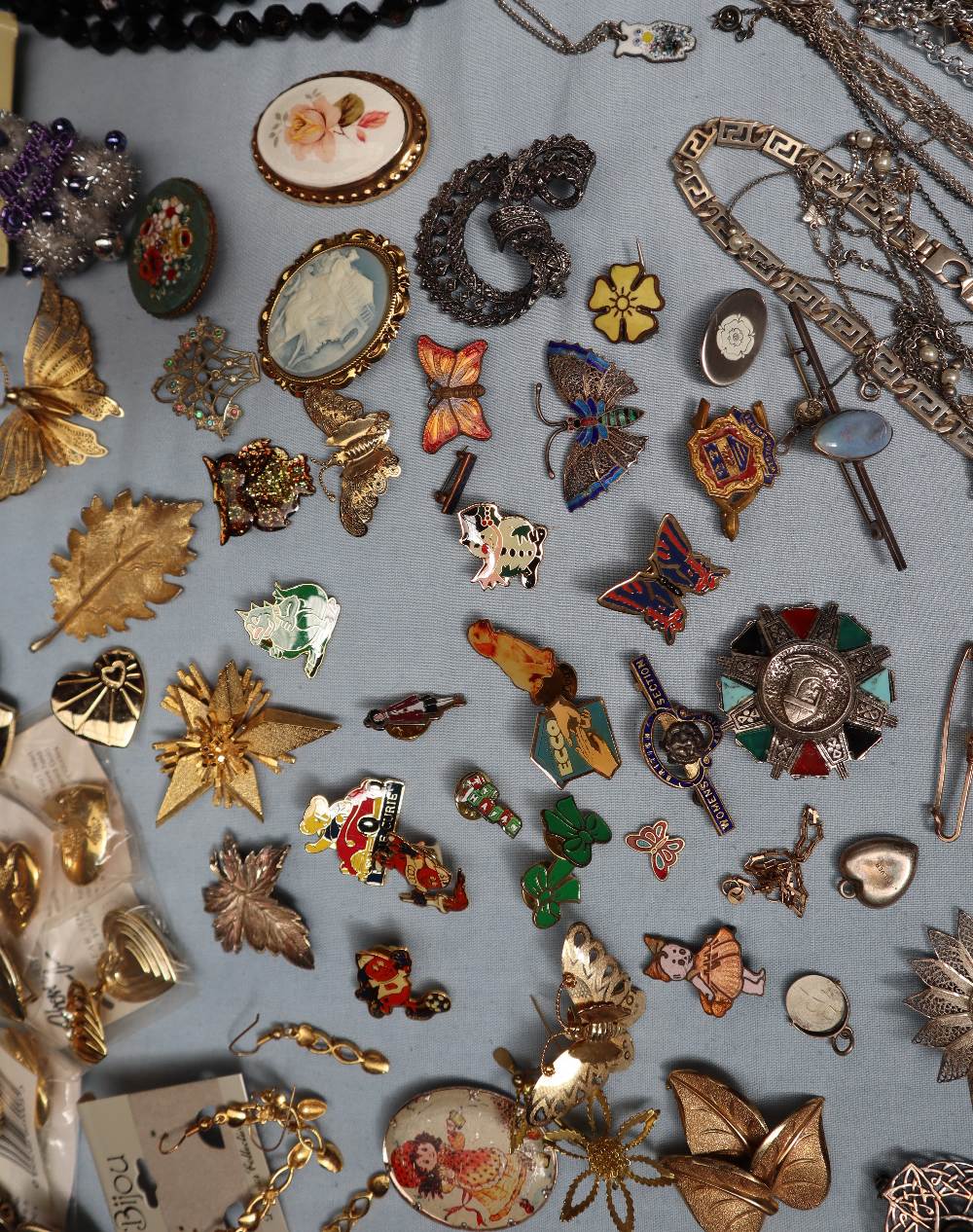 A large collection of costume jewellery including earrings, faux pearl necklaces, rings, medallions, - Image 4 of 7