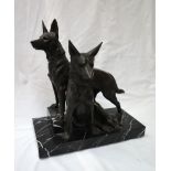 In the style of Plagnet Two German Shepherds On a veined marble base Bears a signature 42cm high x