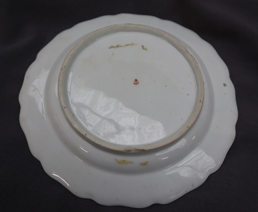 A porcelain plate with a shaped edge, painted with sprays of garden flowers, - Image 4 of 5