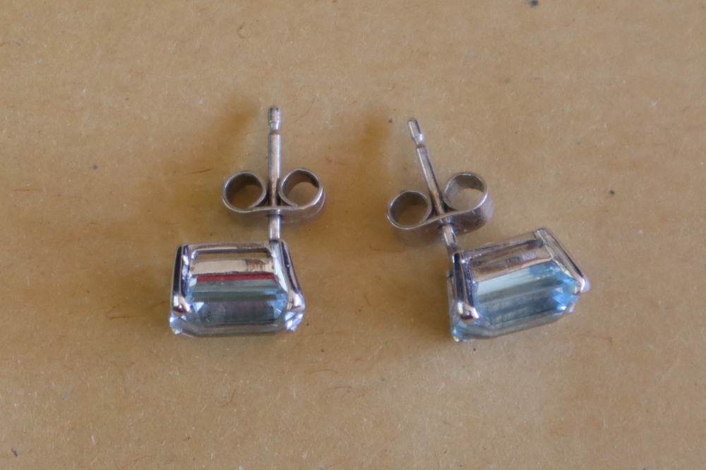 A pair of topaz single stud earrings each emerald cut approximately 2cts to a white metal setting - Image 3 of 4