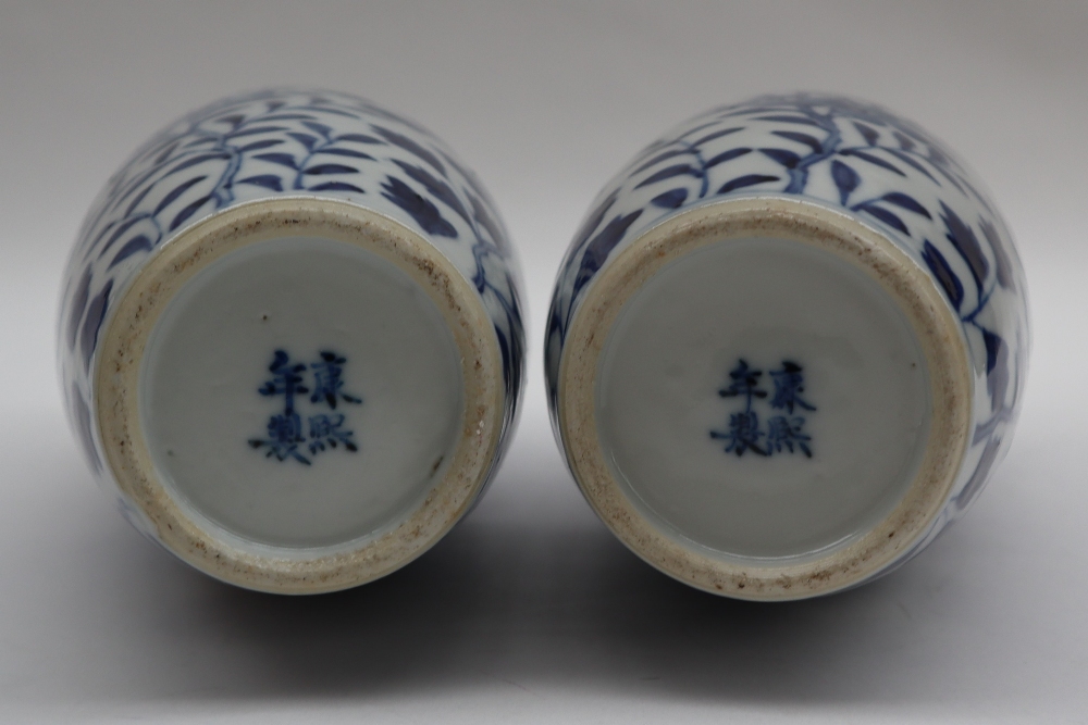 A pair of Chinese porcelain vases of tapering shape decorated with four toed dragons, - Image 7 of 7