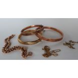 Three 9ct yellow gold hinged bangles together with a 9ct gold bracelet and two 9ct gold necklaces,