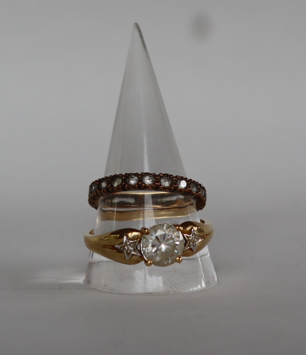 A 14ct gold dress ring set with a round faceted cubic zirconium, size U 1/2, approximately 3.