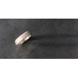 A platinum wedding band, size L 1/2, approximately 5.