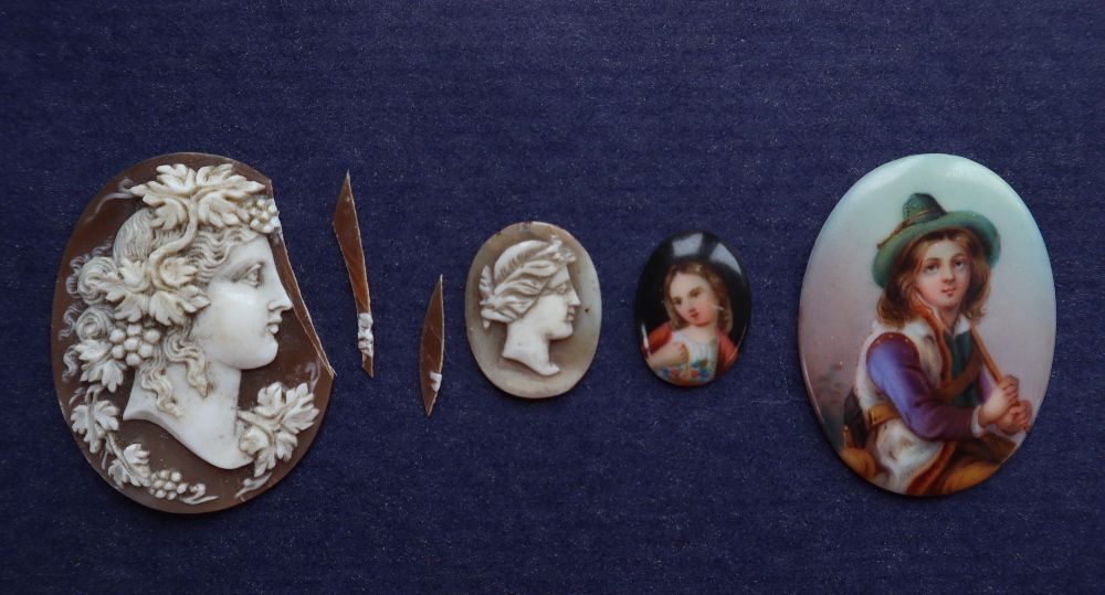 A shell cameo of oval form depicting a bacchanalian head in profile together with another small