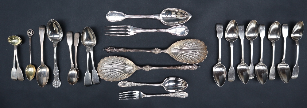 A late Victorian silver spoon and fork set, with scrolling leaf decoration, Sheffield, 1895,