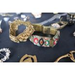 Assorted costume jewellery including brooch, wristwatches,