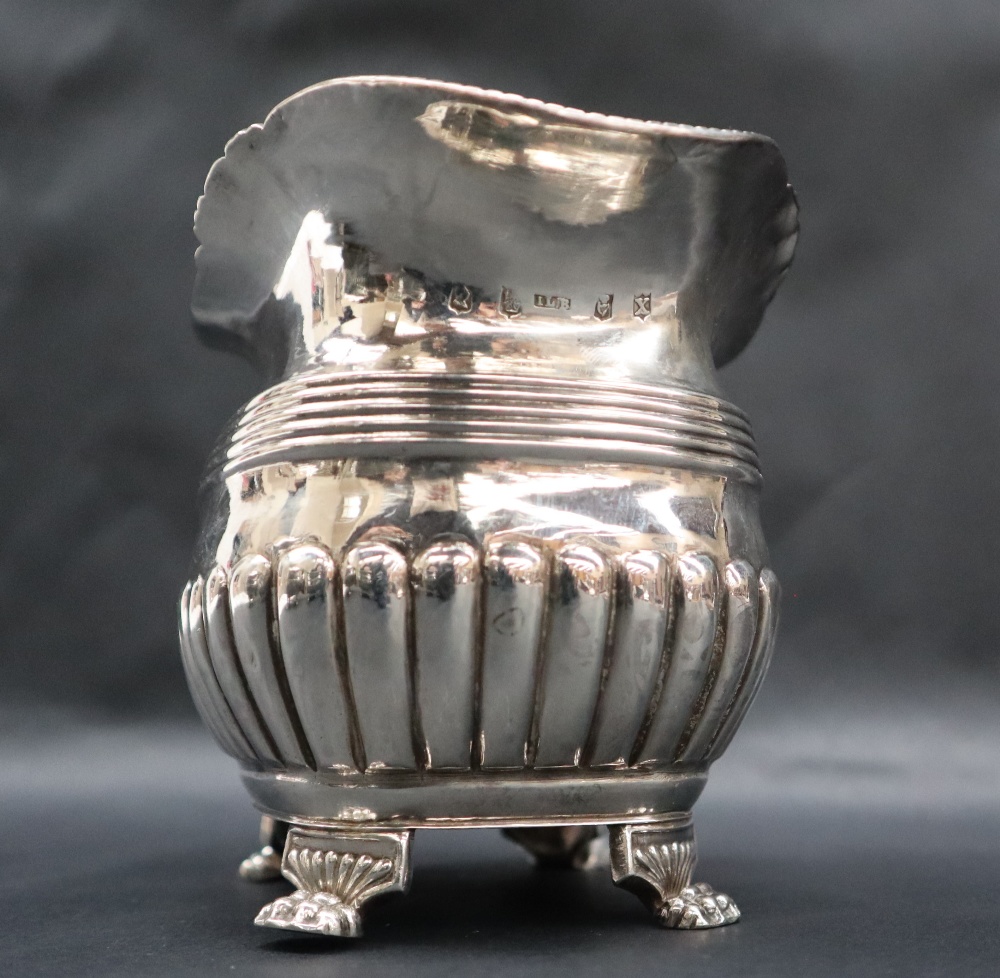 A George III Irish silver three piece tea set, - Image 8 of 9