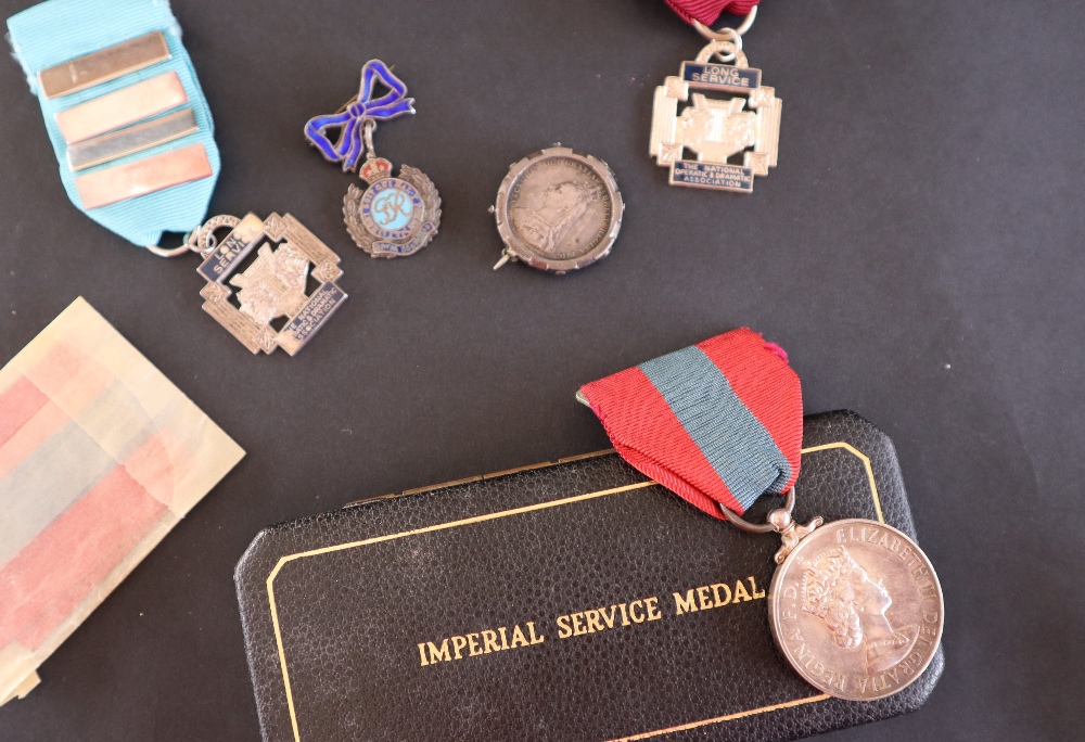 An Elizabeth II Imperial Service Medal, issued to Thomas Howell Pugh, - Image 3 of 4