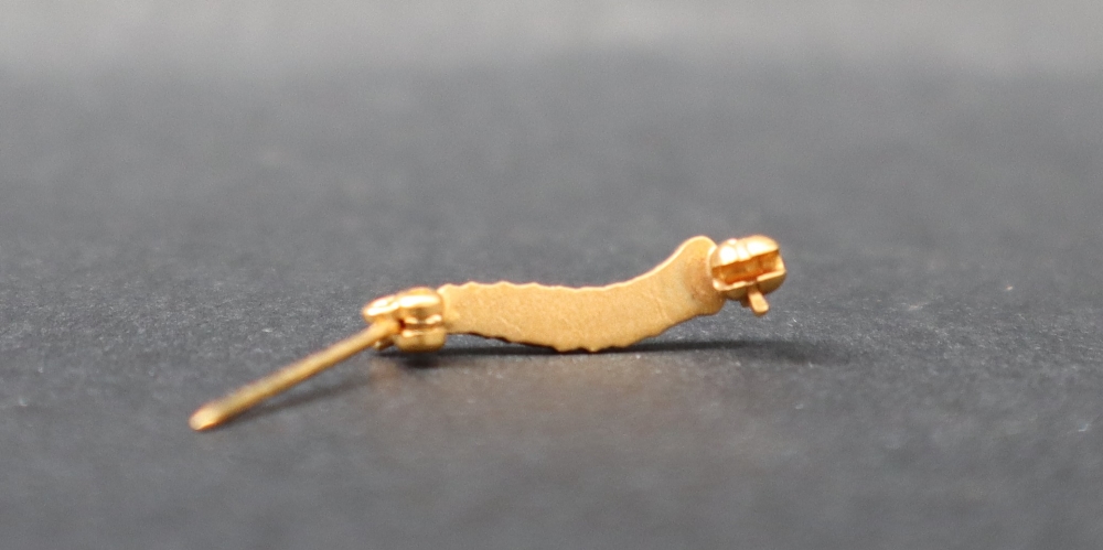 A yellow metal Caterpillar Club pin badge, - Image 3 of 3