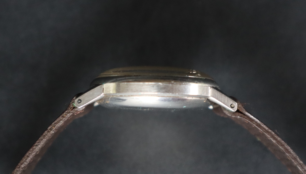 A mid-20th century Omega wristwatch, the silvered dial with Arabic numerals and dot markers, - Image 5 of 6
