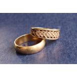 A 9ct yellow gold wedding band, size S, together with another 9ct gold paste set ring,