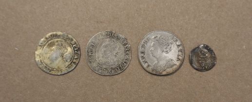 An Elizabeth I silver sixpence dated 1566 together with a 1571 example,