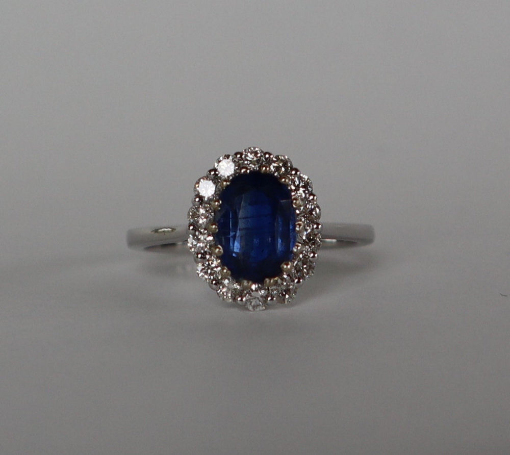 An 18ct white gold kyanite and diamond cluster ring set with an oval faceted Kyanite approximately - Image 4 of 9